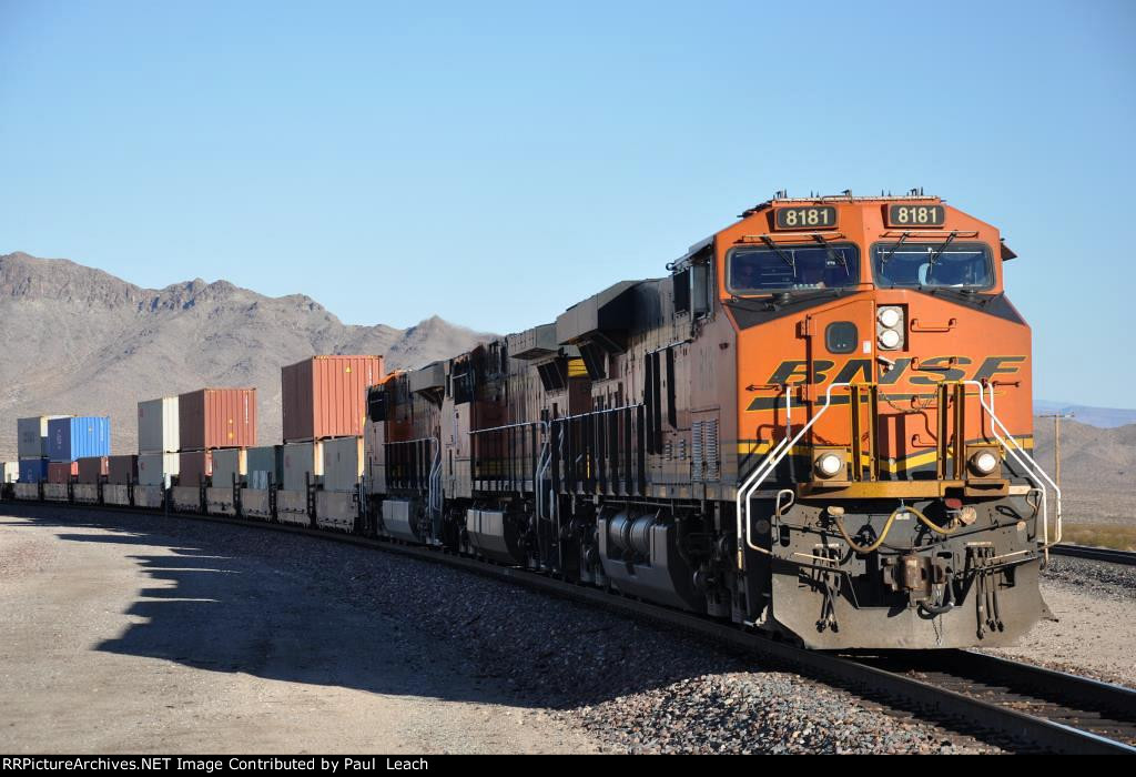 Westbound stack train climbs the grade